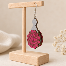 Load image into Gallery viewer, Side view of a Mystic Mandala Bloom wooden earring showing the 2 mm American linden base with matching hand-painted mandala pieces layered on both sides and a single silver-tone hook attached to the base.