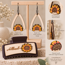 Load image into Gallery viewer, Sunflower Blessed wooden earrings shown front and back with the same layered sunflower design on both sides, plus a side view highlighting the 2 mm American linden wood thickness and matching hair clip.