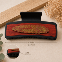 Load image into Gallery viewer, Large 5-inch black hair clip with hand-painted American linden wood base and layered feather detail, showing 1.5 mm wood thickness.