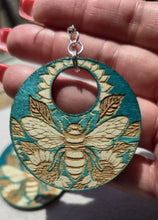 Load image into Gallery viewer, Bee &amp; Bloom – Turquoise Laser Engraved Wood Earrings with Sunflower &amp; Bee Design
