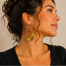Load image into Gallery viewer, Model wearing Bag &amp; Heels 3D wooden earrings with a simple black top and hair pulled back.
